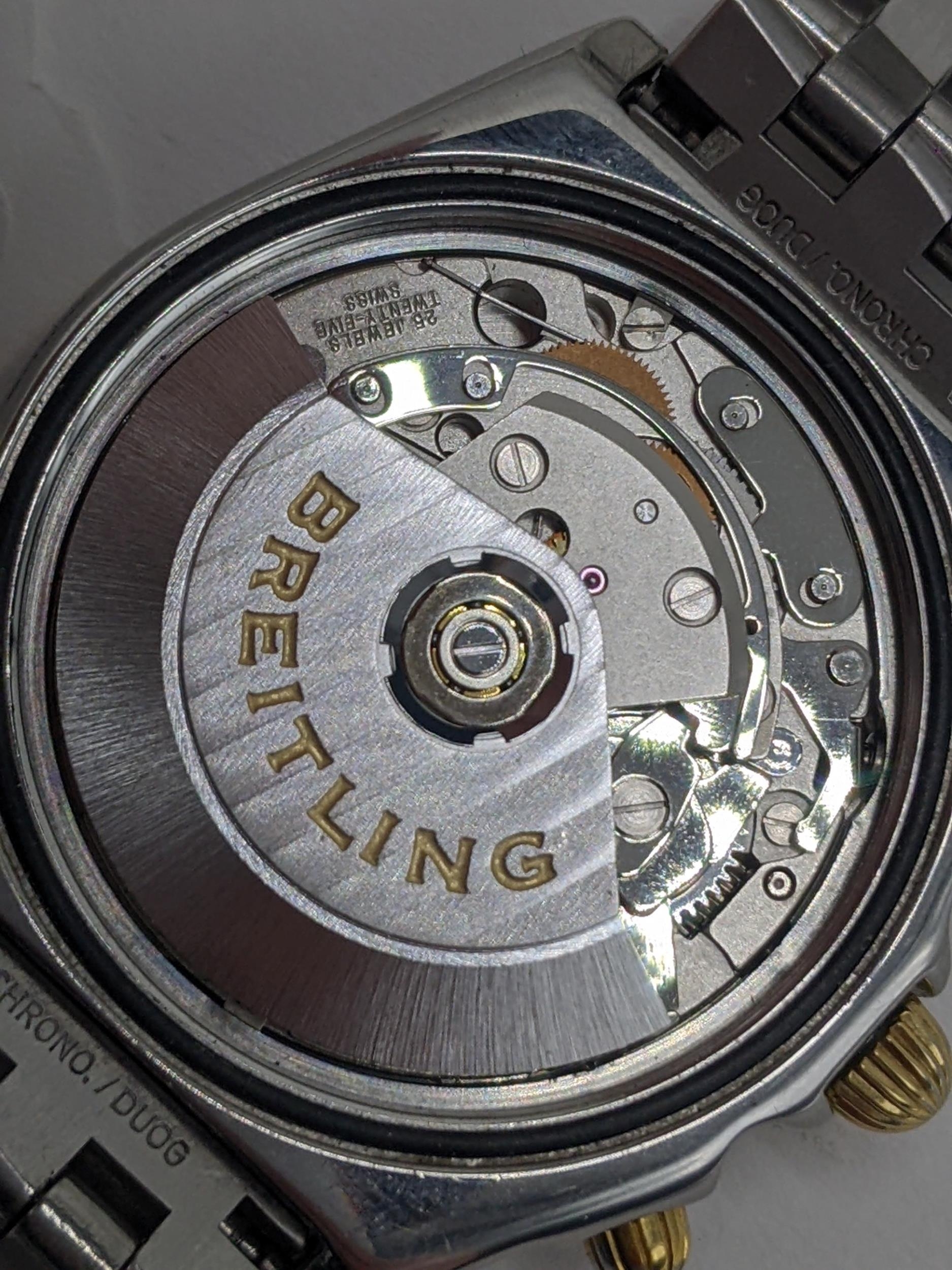 A Breitling Chronomat chronograph gents, automatic, stainless steel wristwatch with gold rider tabs, - Image 4 of 8