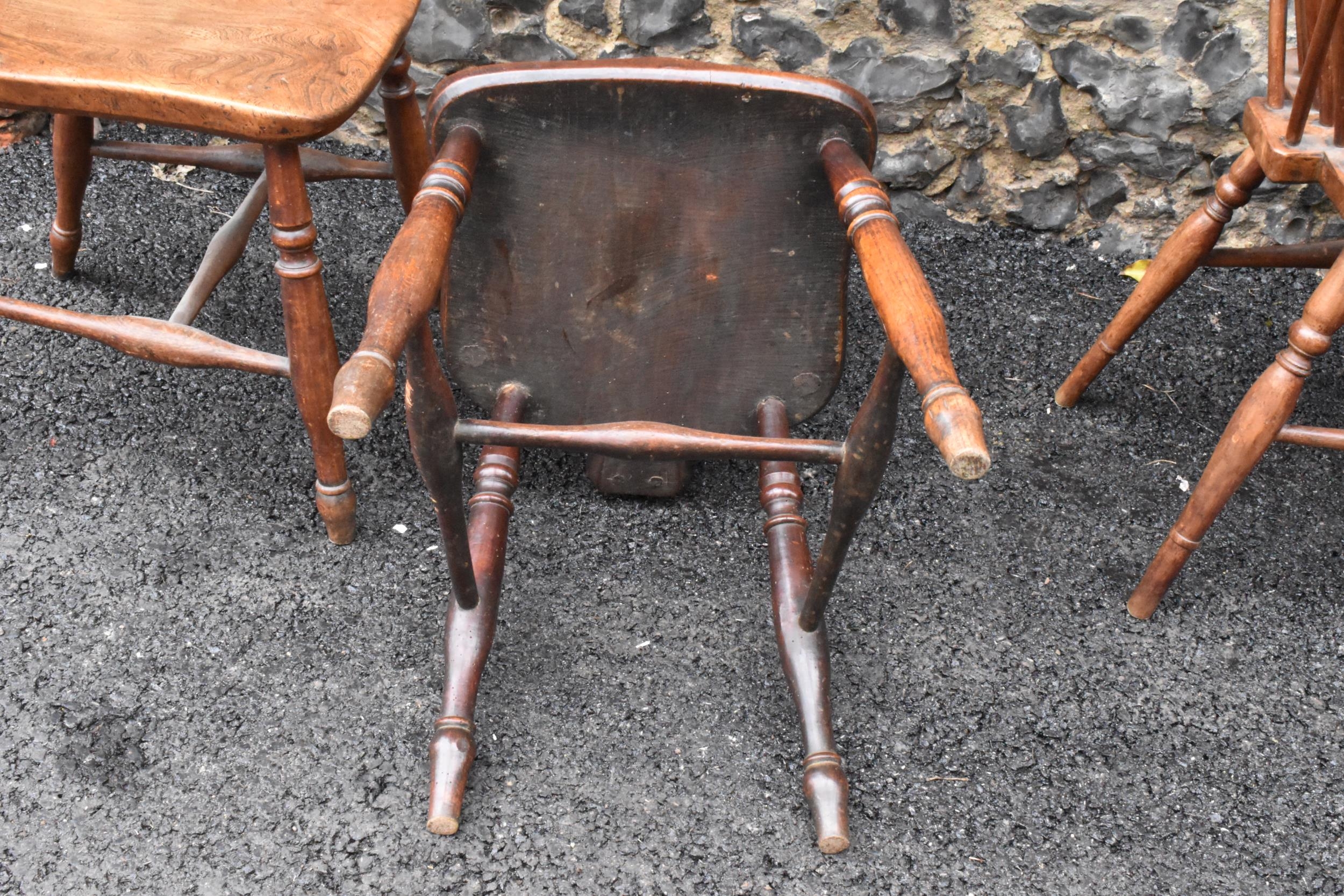 A set of four 19th century elm and ash Windsor dining chairs, having spindle hoop shaped backs, - Image 10 of 10