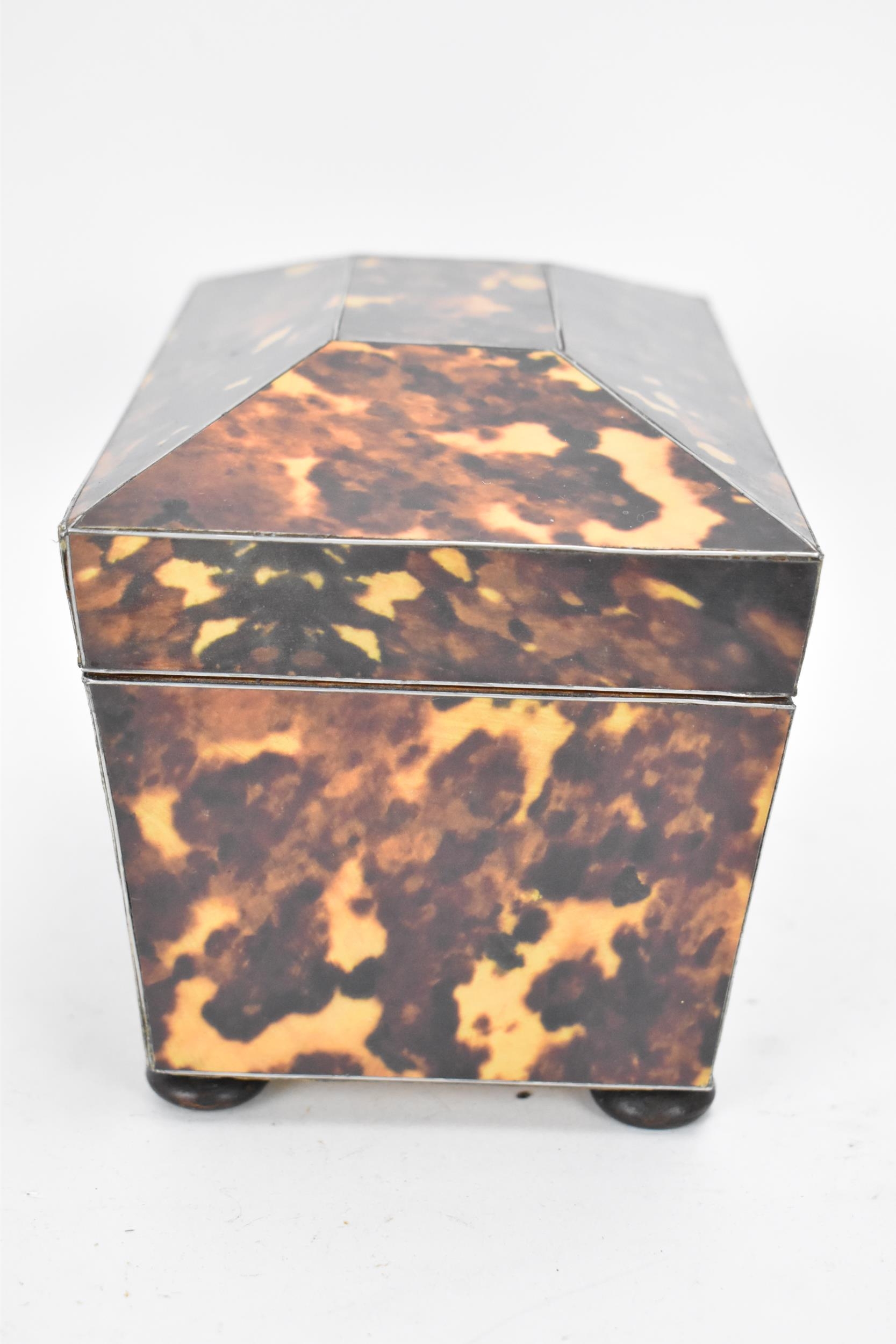 A late 20th century printed tortoiseshell pattern, twin compartment tea caddy, of sarcophagus form - Image 3 of 8