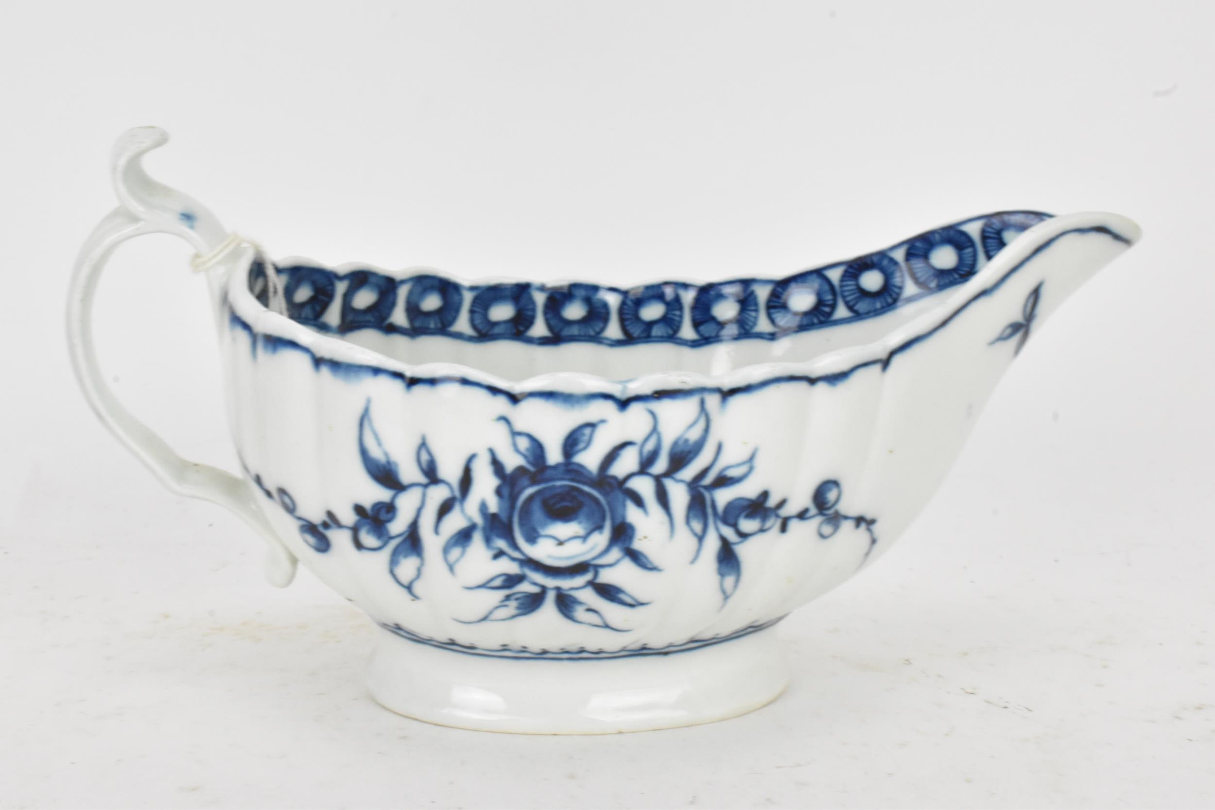 An 18th century Worcester porcelain blue and white sauce boat, circa 1770-80, moulded fluted form