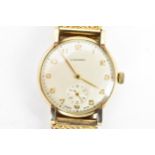 A Longines, manual wind, gents, 9ct gold wristwatch, circa 1950s, having a silvered dial, subsidiary
