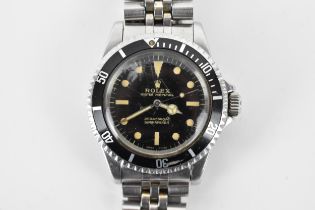 A Rolex Submariner, automatic, gents, stainless steel wristwatch, circa 1966, having a black dial