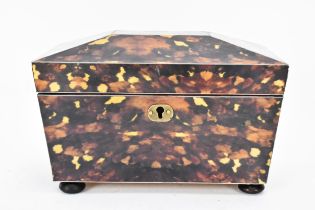 A late 20th century printed tortoiseshell pattern, twin compartment tea caddy, of sarcophagus form