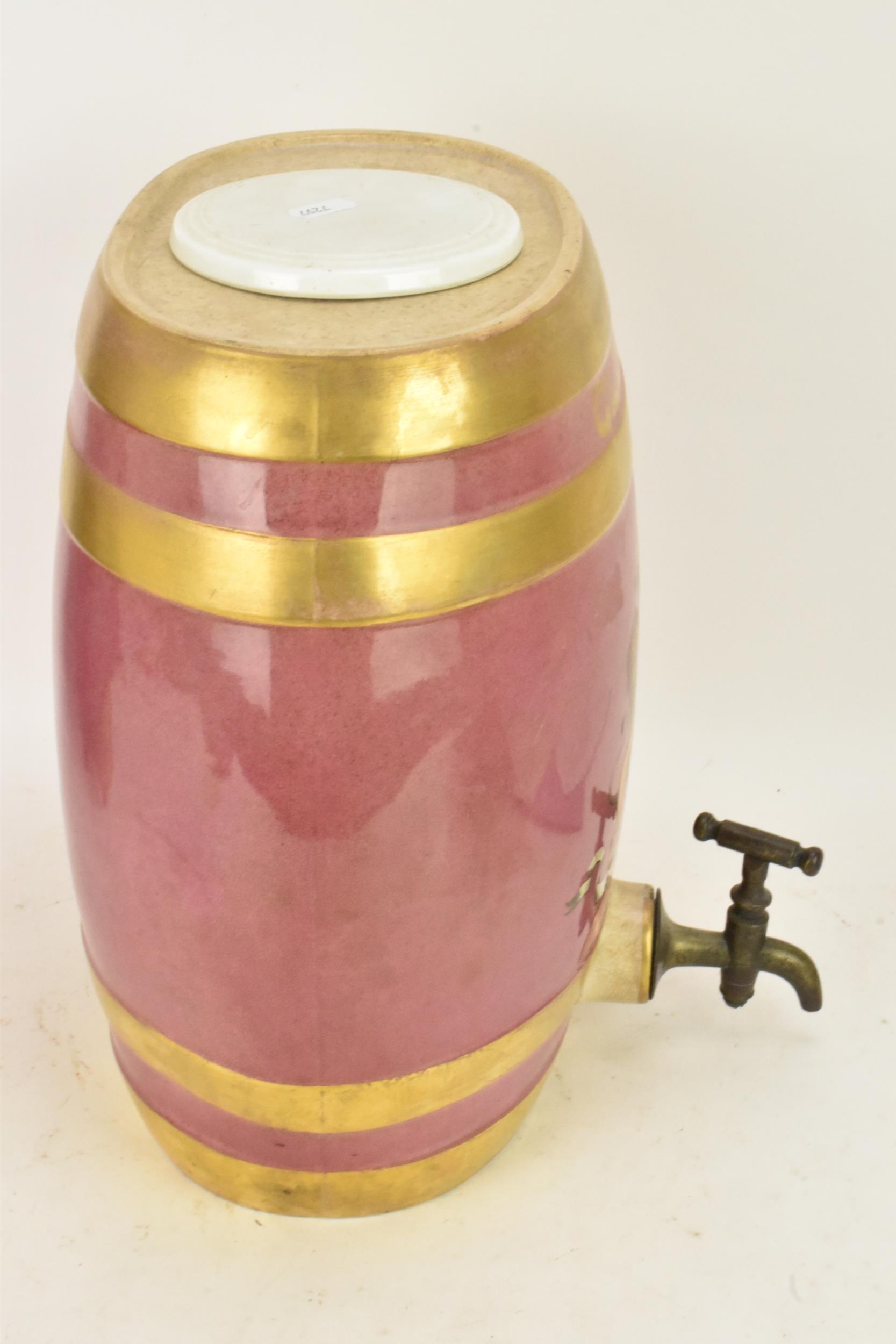 A Victorian ceramic cloves barrel, of oval shape and decorated with a pink ground with gilt bands - Image 4 of 6