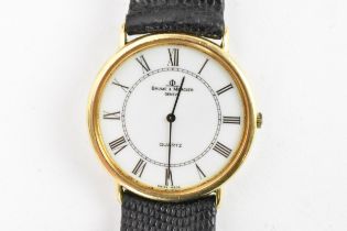 A Baume & Mercier, quartz, gents, 18ct gold wristwatch, having a white dial with black Roman