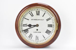 A 19th century mahogany cased dial clock, the 10" white painted dial with Roman numerals, signed Jas