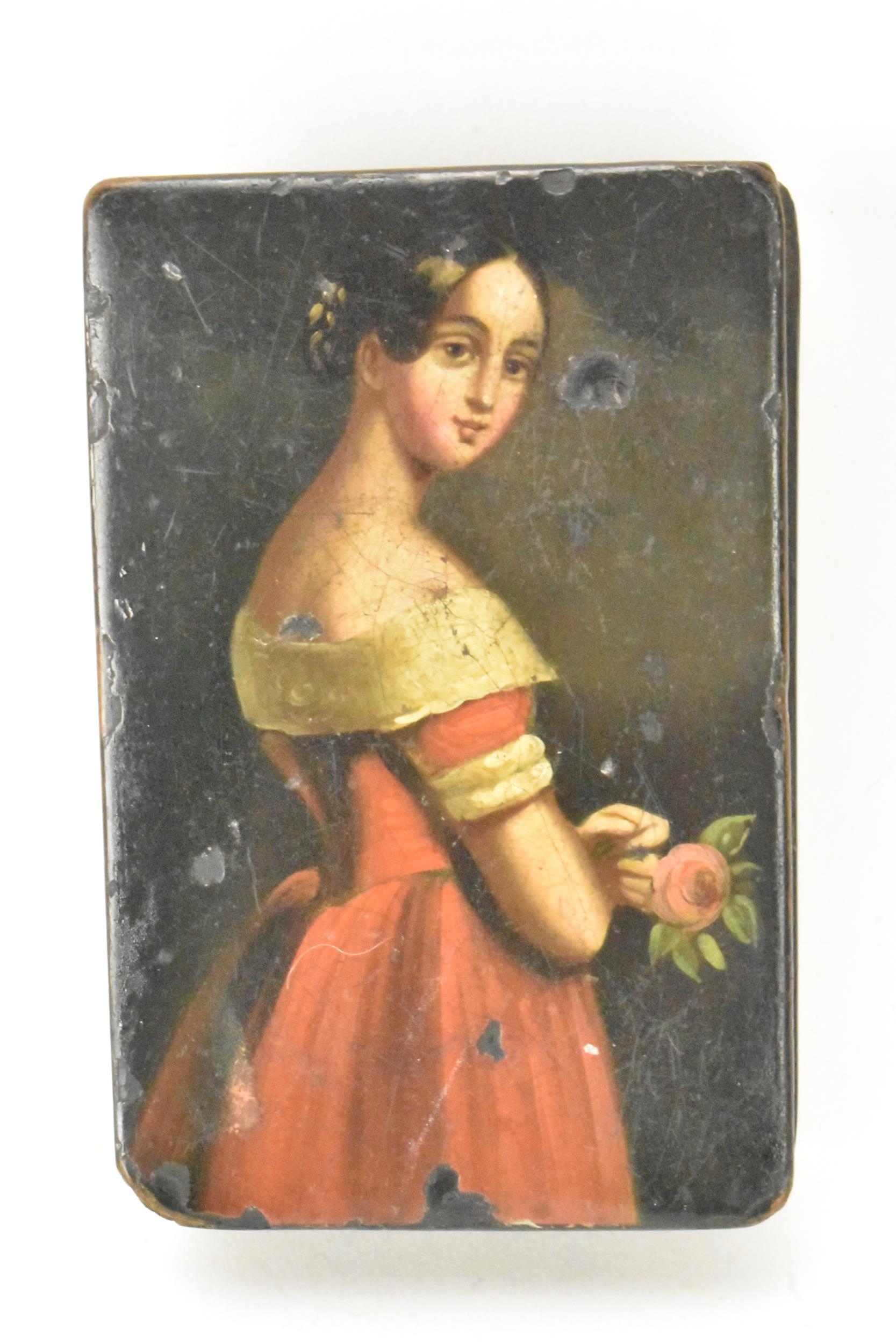 A 19th century black papier mache snuff box, the the hinged cover painted with a three quarter