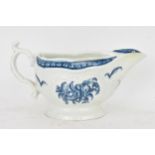 An 18th century Worcester porcelain blue and white sauce boat, circa 1770-80, moulded with