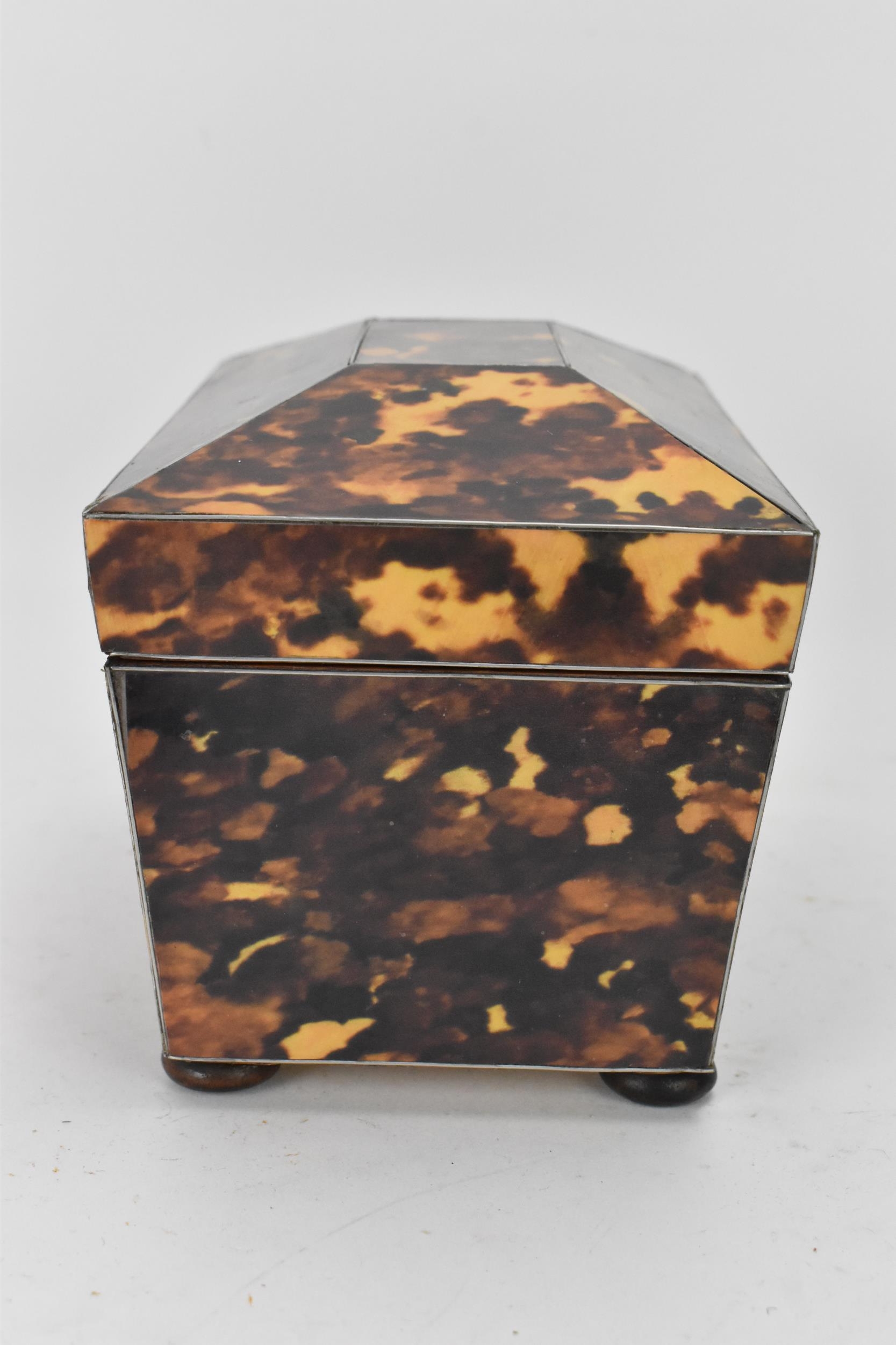 A late 20th century printed tortoiseshell pattern, twin compartment tea caddy, of sarcophagus form - Image 5 of 8