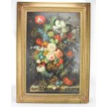 L. Martin - A 20th century oil on canvas depicting a still life study of roses, grapes and peaches