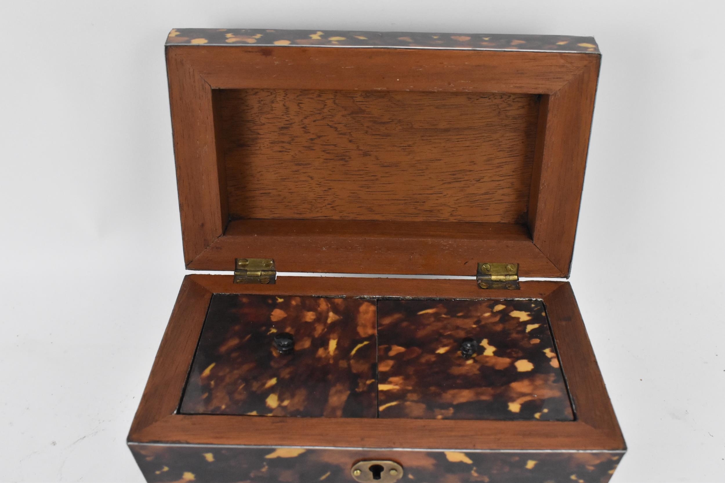 A late 20th century printed tortoiseshell pattern, twin compartment tea caddy, of sarcophagus form - Image 7 of 8