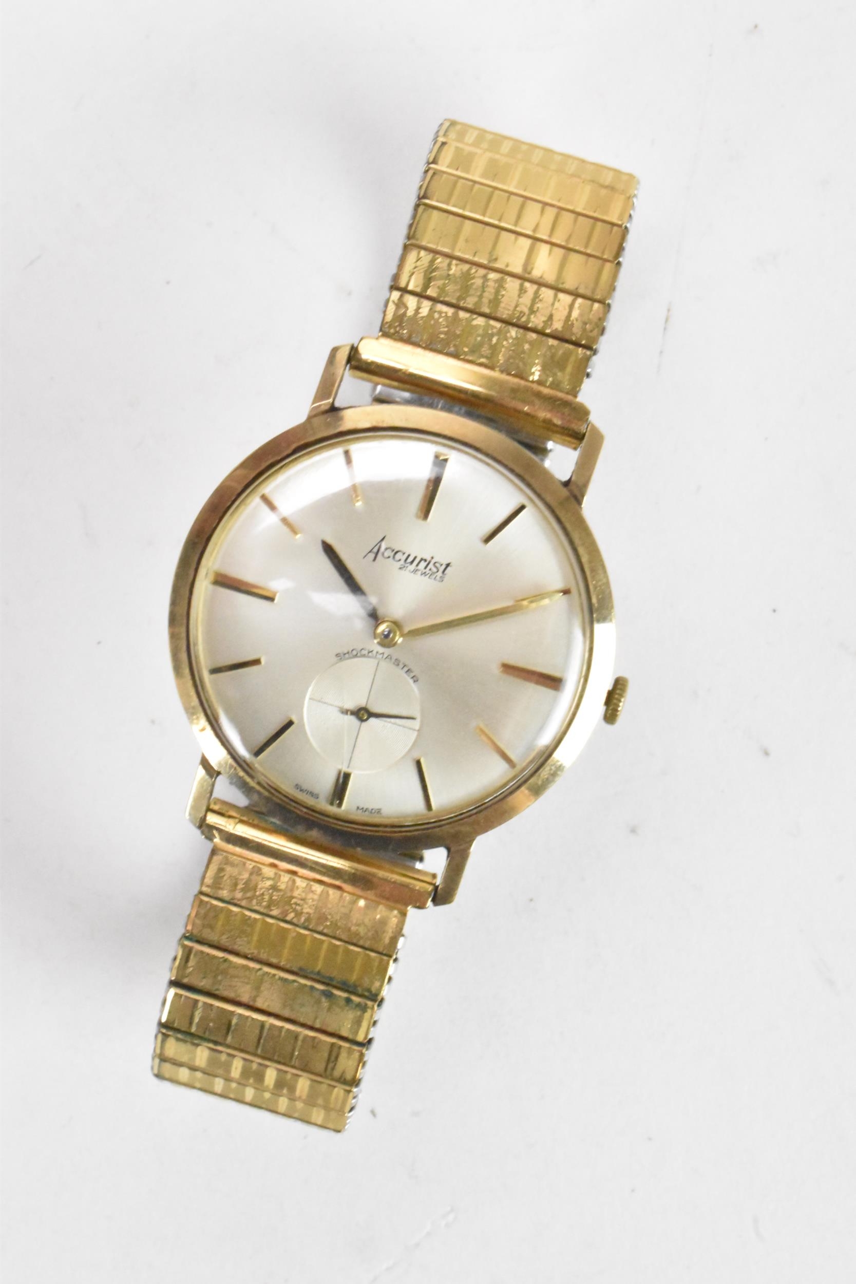 An Accurist, manual wind, gents, 9ct gold wristwatch, having a silvered dial, subsidiary seconds - Image 2 of 7