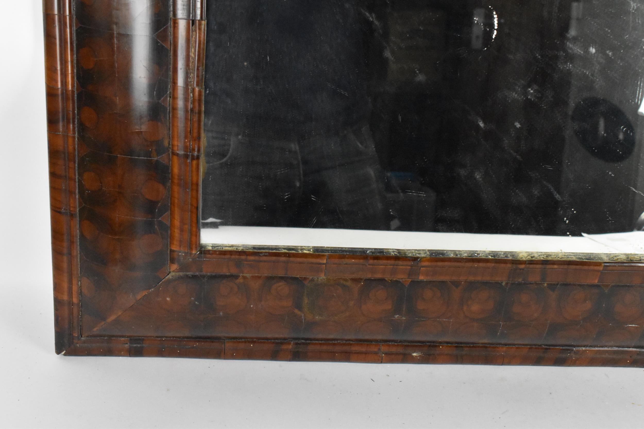 A William and Mary walnut oyster veneered mirror, circa 1690, having a cushion moulded frame, the - Image 4 of 6