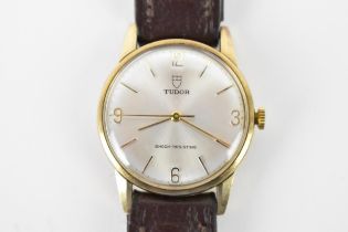 A Tudor, manual wind, gents, 9ct gold wristwatch, circa 1970s, having a silvered dial, centre