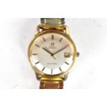 An Omega Seamaster, automatic, gents, gold plated wristwatch, having a silvered dial, centre