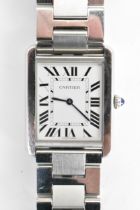 A Cartier Tank Solo, quartz, stainless steel wristwatch, having a silvered dial