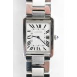 A Cartier Tank Solo, quartz, stainless steel wristwatch, having a silvered dial