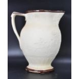 A circa 1800 Turner stoneware jug, moulded decoration depicting a hunting scene and with brown