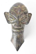 A 20th century bronze Sanxingdui head in the Bronze Age, 1700-1150 BC style, with large elongated
