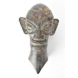 A 20th century bronze Sanxingdui head in the Bronze Age, 1700-1150 BC style, with large elongated