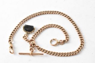 An early 20th century 9ct gold curb link pocket watch chain having a 9ct gold T-bar, 9ct gold dog