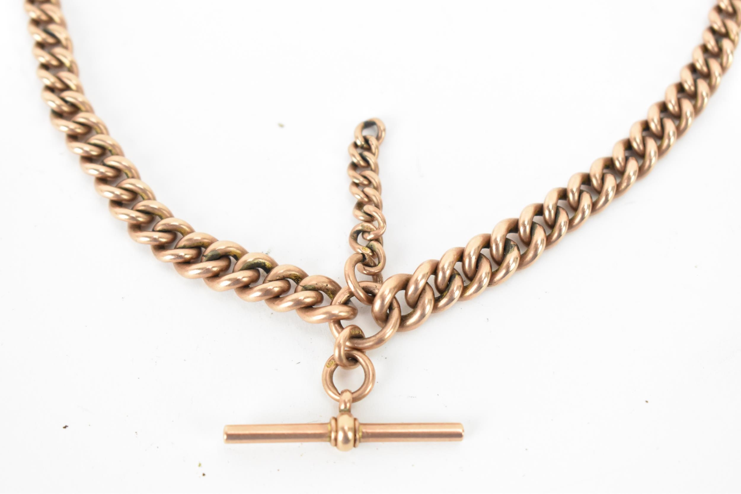 A Victorian 9ct gold curb link pocket watch chain, having graduated links, 9ct gold T-bar and two - Image 2 of 4