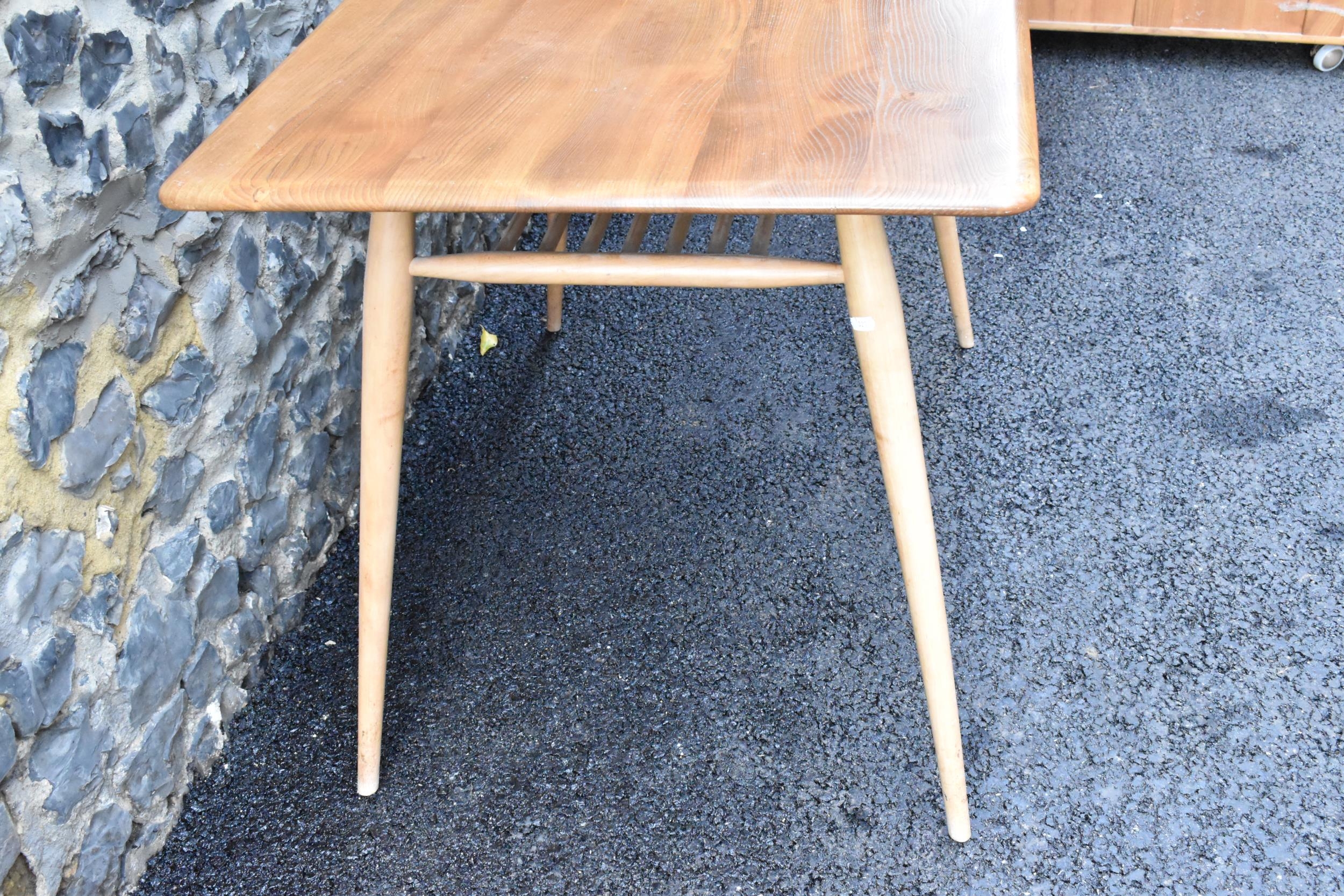 A 1960s Ercol blonde elm and beech breakfast table, model 395, having a rectangular top with a - Image 4 of 6
