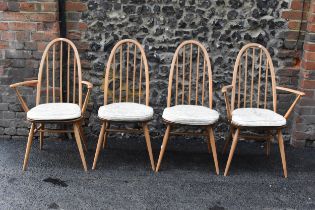 A set of four 1960s Ercol chairs blonde elm and beech 'Quaker' dining chairs, two being carvers,