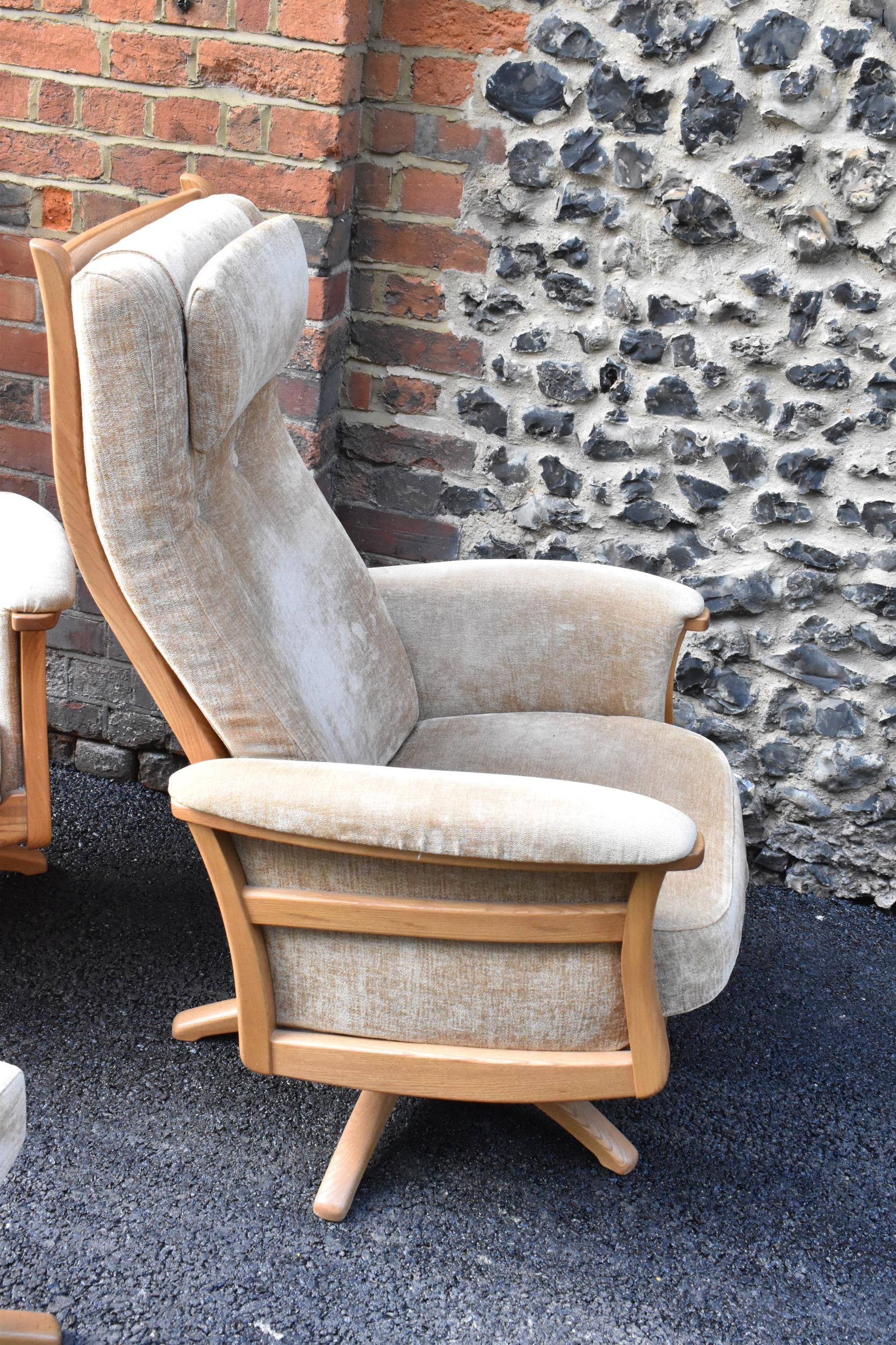 A pair of vintage Ercol Gina light elm manual reclining armchairs upholstered in beige fabric with - Image 4 of 6