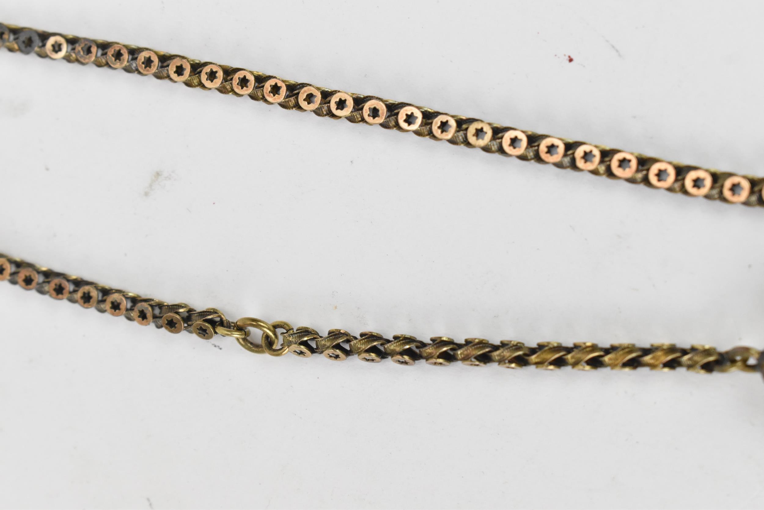 A Victorian yellow metal Albertina pocket watch chain having a fancy tassel charm and a 15ct gold - Image 3 of 4