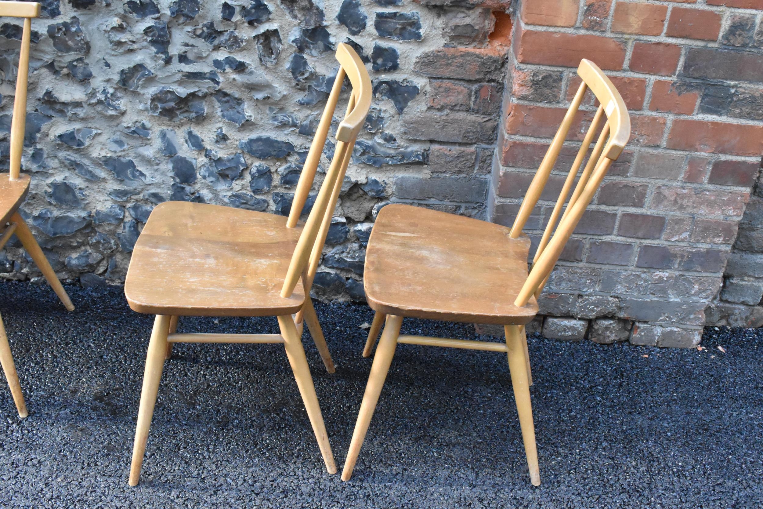 A set of four Ercol blonde elm and beech kitchen dining chairs, model 391, having spindle stick back - Image 5 of 9