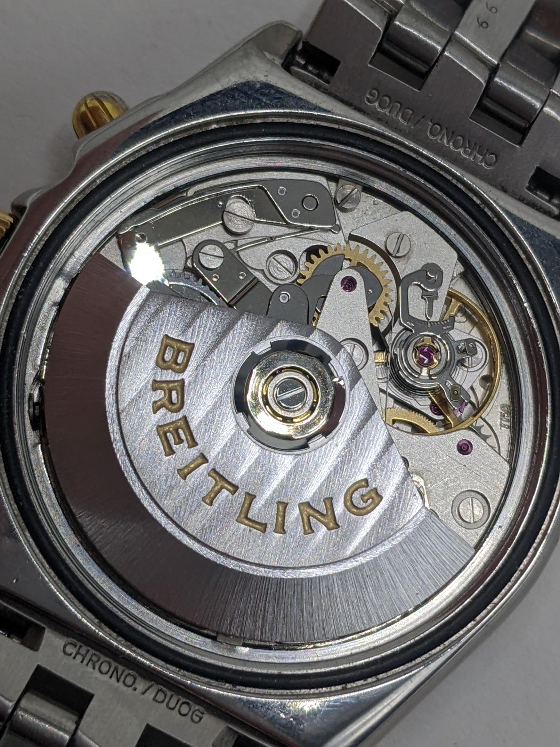 A Breitling Chronomat chronograph gents, automatic, stainless steel wristwatch with gold rider tabs, - Image 3 of 8