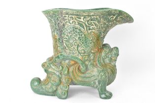 A 20th century Chinese carved green soapstone vase/ drinking vessel, the upper vessel carved in