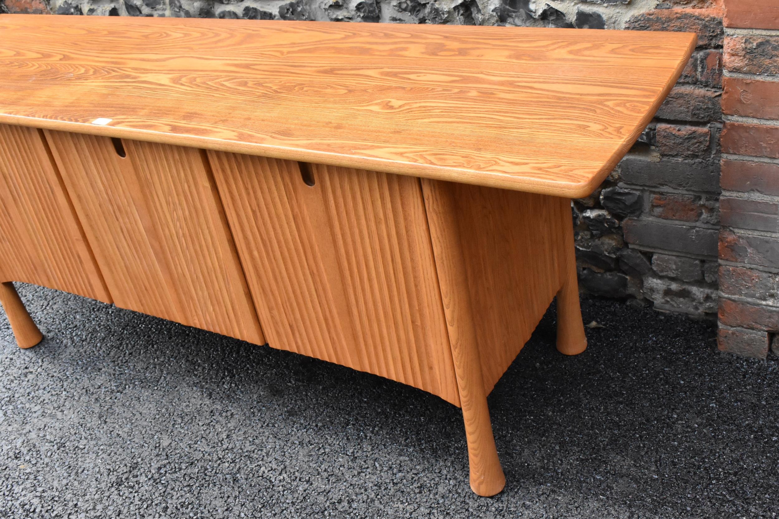 A rare 20th century Ercol Saville elm sideboard The oversized plank top raised over a ridged base - Image 4 of 6