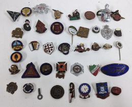 A selection of vintage badges to include Women Suffrage Societies, Ford, Guinness and others