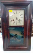 An American walnut cased wall clock having a painted glass pictorial door of a church by a river