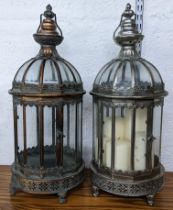 A pair of Moroccan style silvered hanging lanterns with pierced frames, 59.5cm h Location: