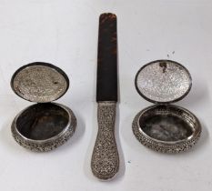 Two Malayan silver coloured red metal boxes and a page turner Location: cab