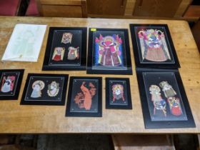 A group of Chinese paper kites depicting various deities and others in mask form, hand coloured