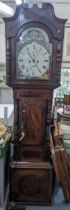 A George III mahogany 8-day longcase clock having a swan neck pediment and turned columns, 224cm h