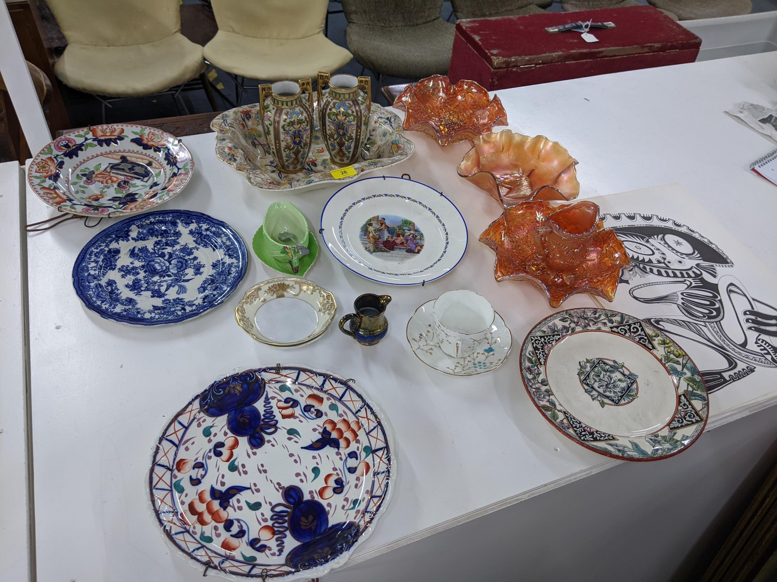 A mixed lot of ceramics and glassware to include a pair of twin handled Noritake vases, three orange