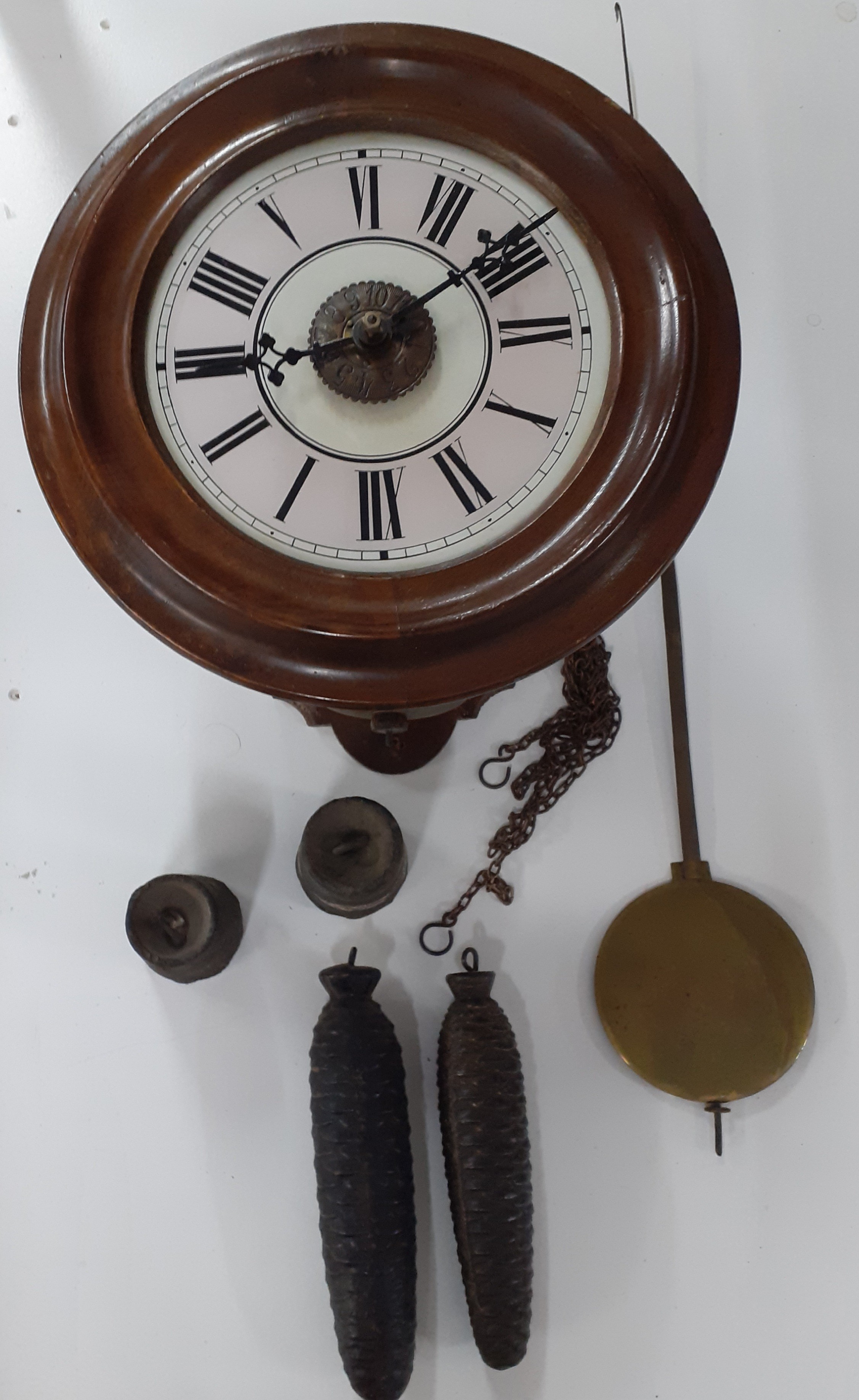 A mahogany cased Postman's alarm wall clock Location: 1:1