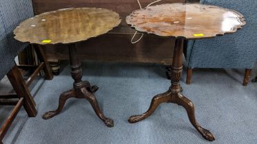 A 19th century tilt top pedestal table, and another similar table, both on three splayed legs with