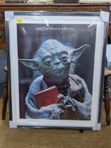 Star Wars poster of Yoda holding a book, used to promote reading in New York (ITG Library dated