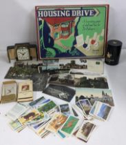 A mixed lot to include a boxed Pepys series Housing Drive board game vintage Bayard travel clock,