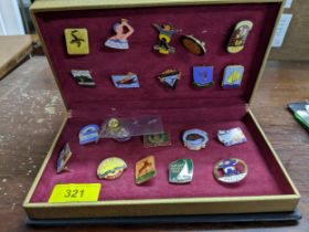 A Butlin's Club enamel badge collection mounted within a case Location: