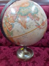 A vintage Replogle Legend 12" World Classic globe on a brass effect base, 17" high. Location: RWF