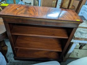 A reproduction mahogany open bookcase, adjustable shelves, plinth base, 101.5cm x 96cm x 36cn