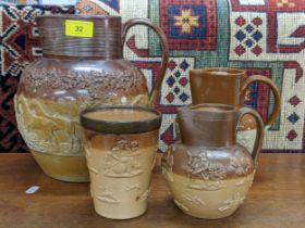 Royal Doulton stoneware to include a large jug having moulded decoration depicting a hunting scene