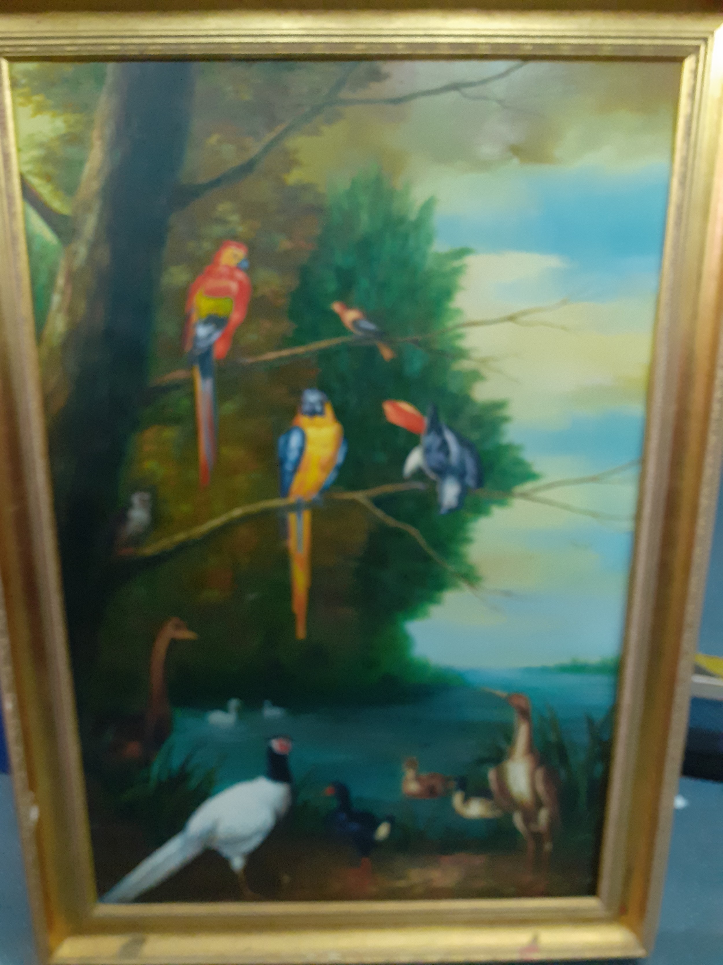 Van Reuron - An oil on canvas 59x89cm, exotic birds on pond and tree to include parrots and ducks,